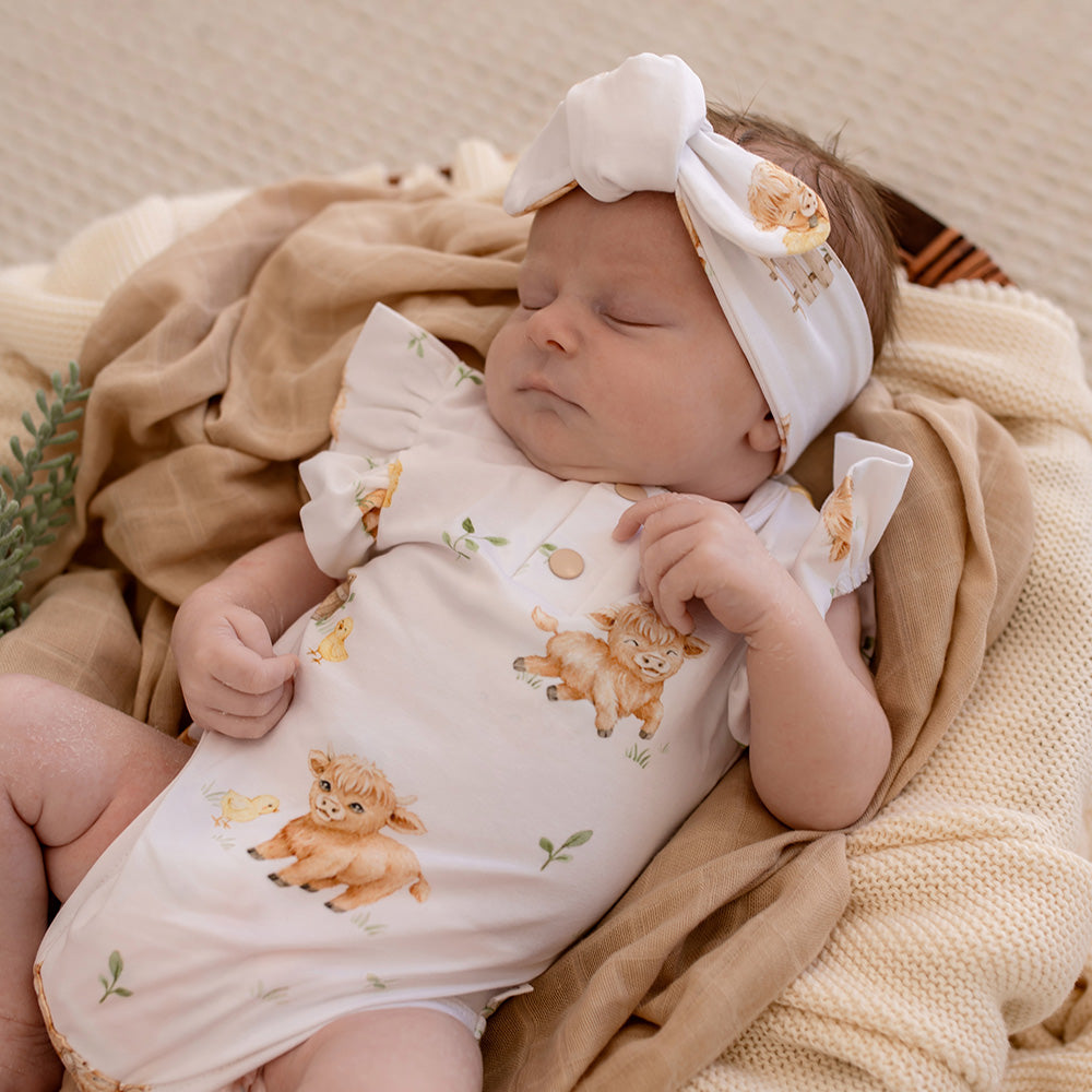 Snuggle Hunny Highland Cows bodysuit with frill lifestyle