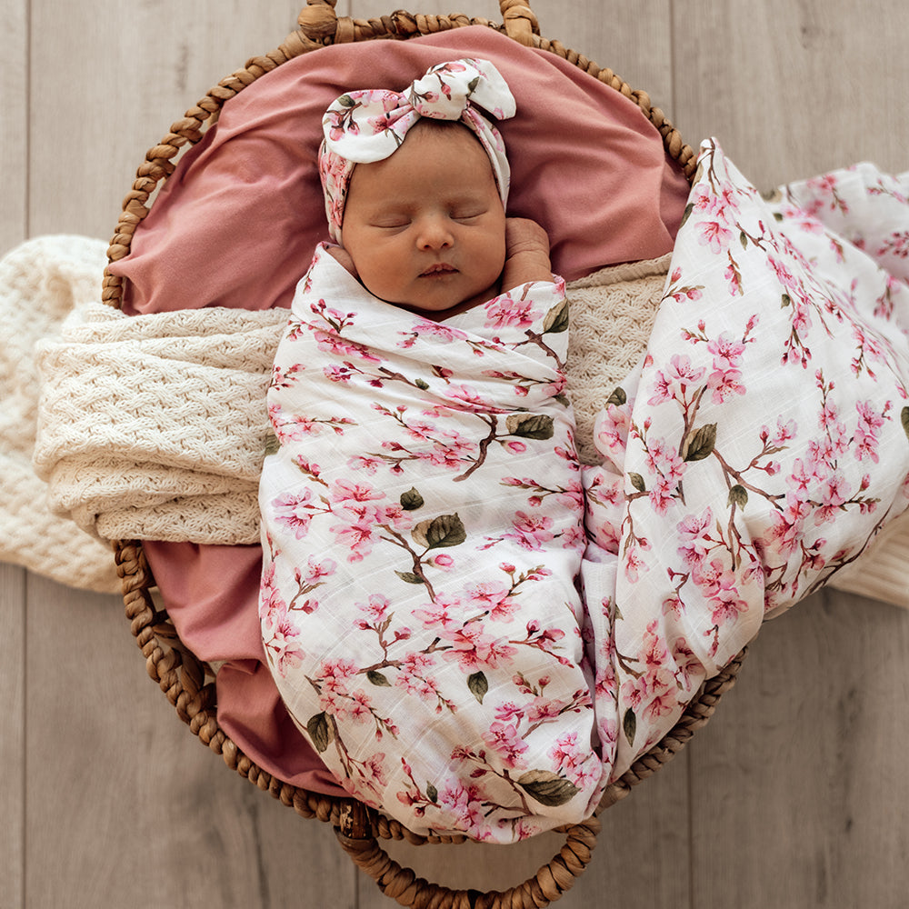Snuggle Hunny Cherry Blossom organic muslin wrap lifestyle