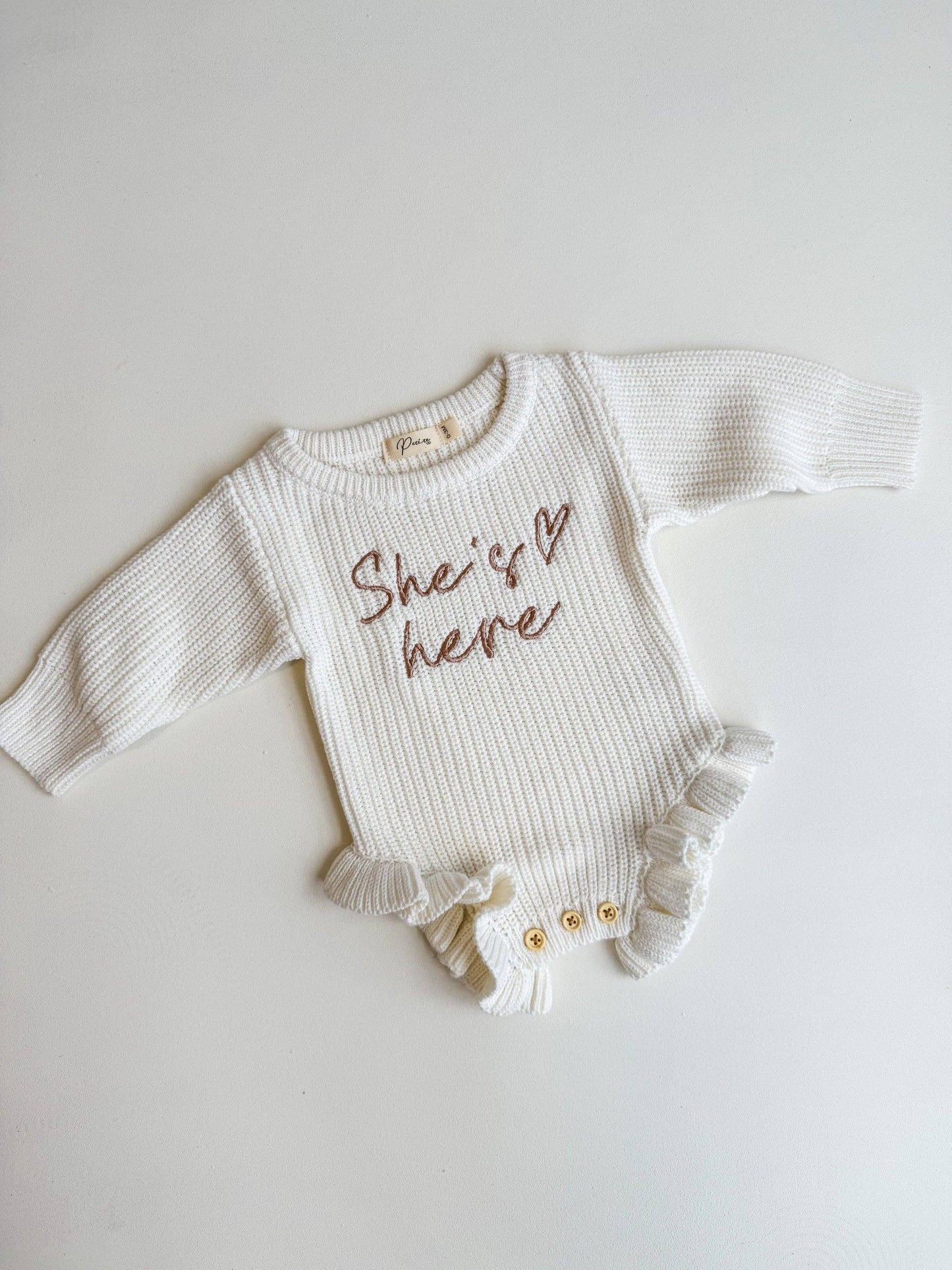 Petite + Co - SHE'S HERE HEART - FRILL LEG ROMPER | MILK
