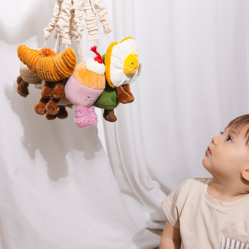 Stroller toy attached to pram