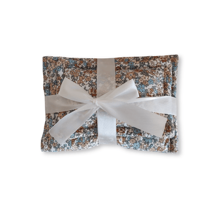 Blue floral doll quilt and pillow styled in a doll basket