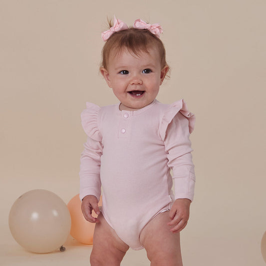 Snuggle Hunny - Baby Pink Long Sleeve Organic Bodysuit with Frill