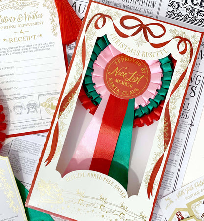 Black Bow Studio - Nice List Member Christmas Rosette Badge Pink/Red