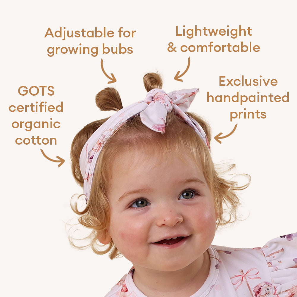 Snuggle Hunny Carousel Organic Topknot