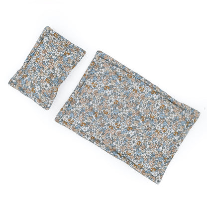 Lola and Bear blue floral doll bedding set quilt and pillow flat lay