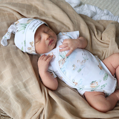 Baby wearing Snuggle Hunny Duck Pond short sleeve organic kimono bodysuit