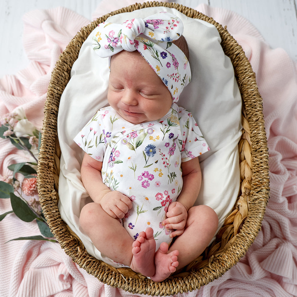 Baby wearing Snuggle Hunny Gracie short sleeve organic kimono bodysuit