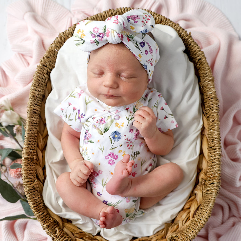 Snuggle Hunny Gracie kimono bodysuit on newborn