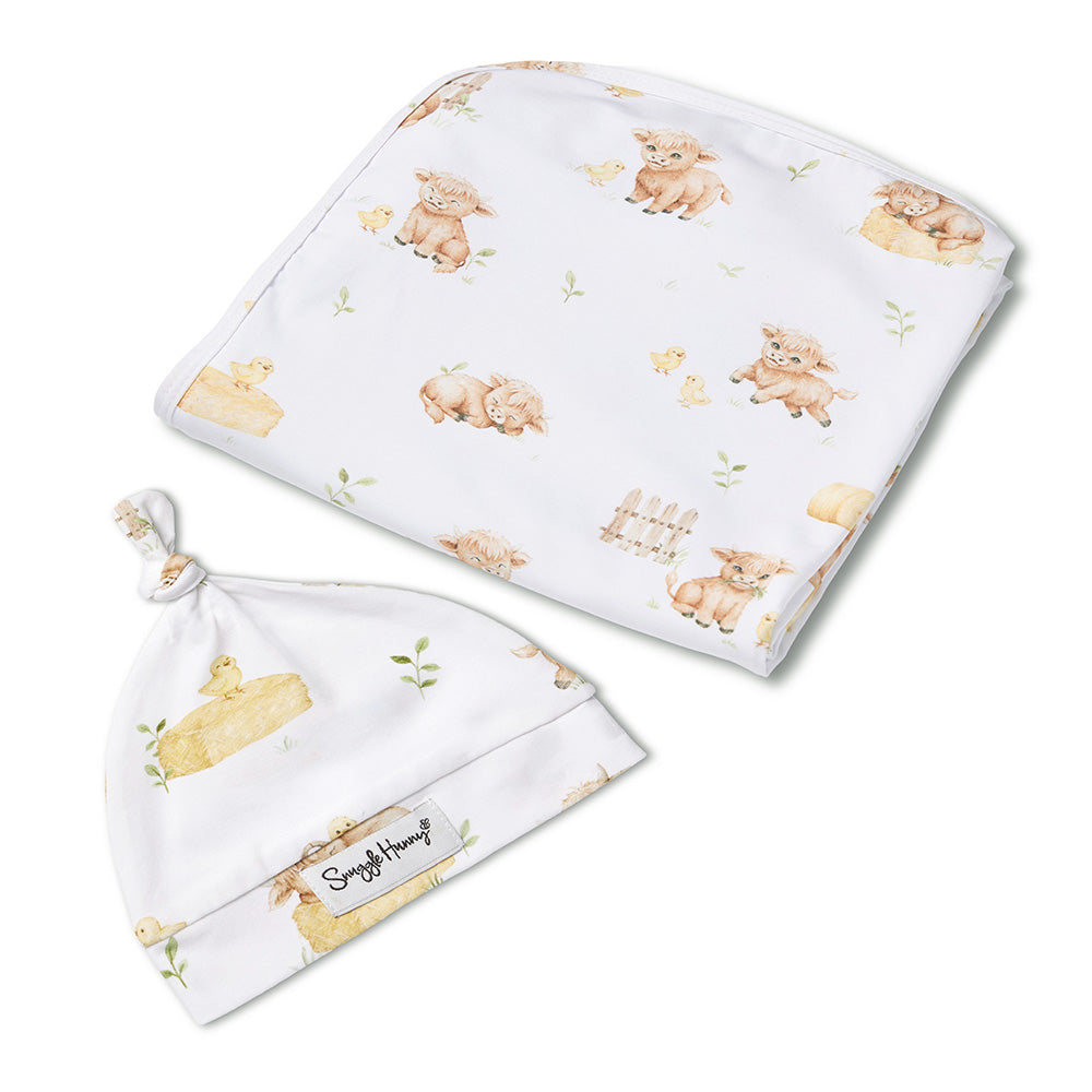 Snuggle Hunny Highland Cows jersey wrap and beanie set flatlay