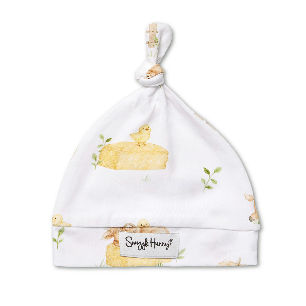 Snuggle Hunny Highland Cows organic knotted beanie flatlay