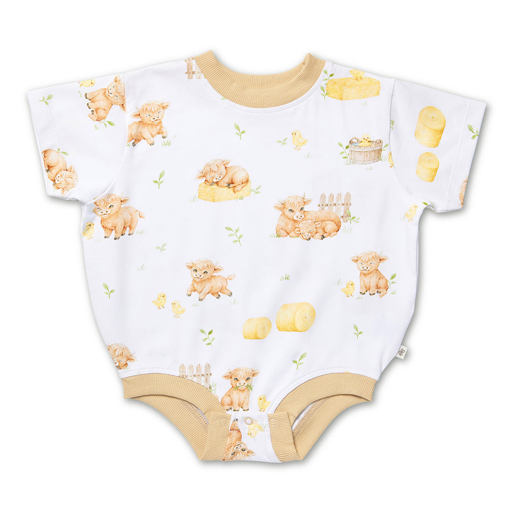 Snuggle Hunny Highland Cows organic oversized romper flatlay