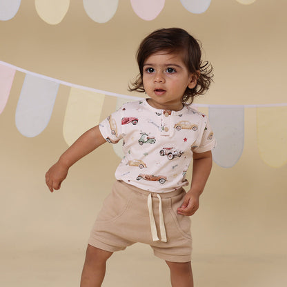 Snuggle Hunny Pebble organic shorts styled with bodysuit